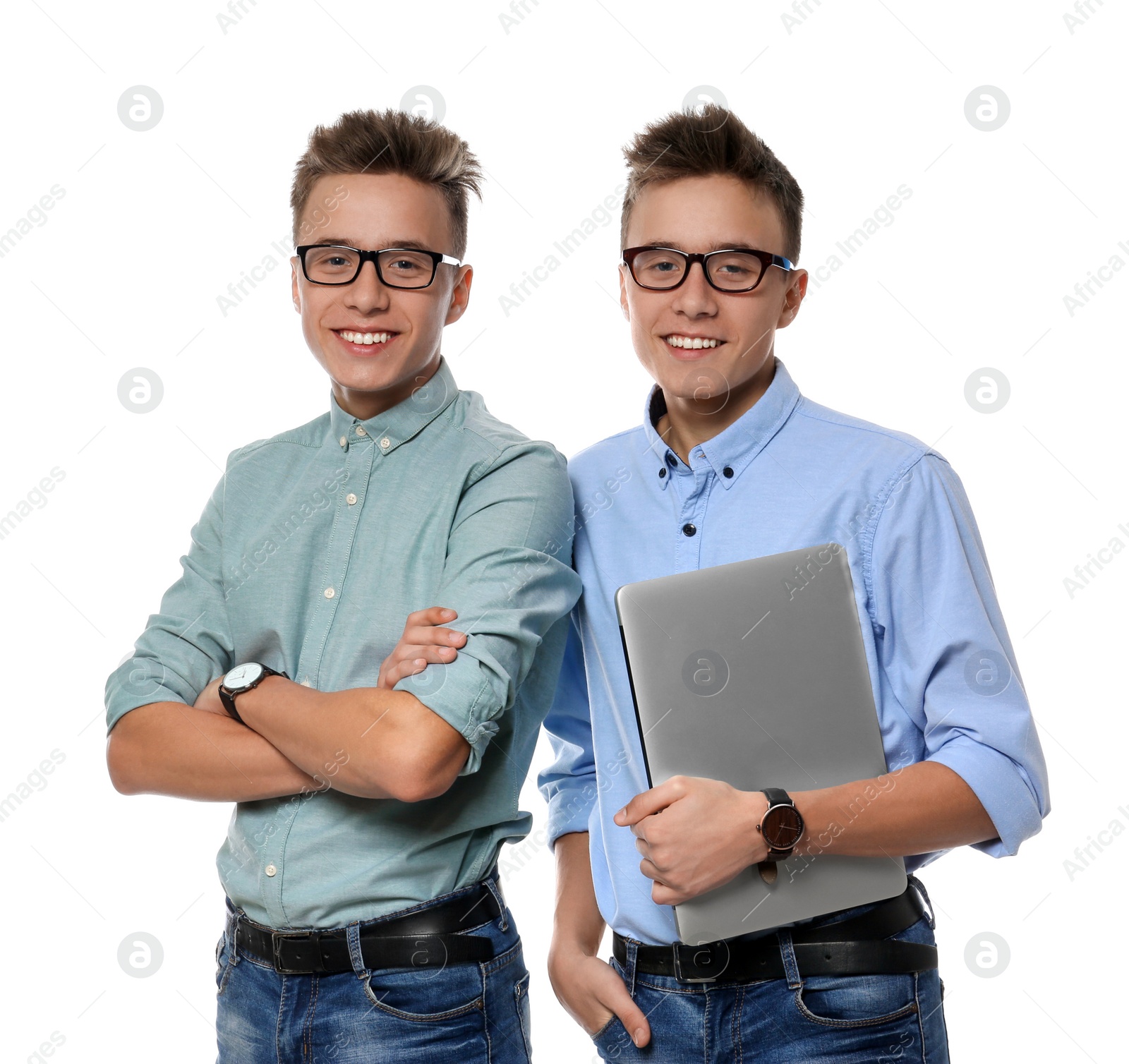 Photo of Teenage twin brothers with glasses on white background