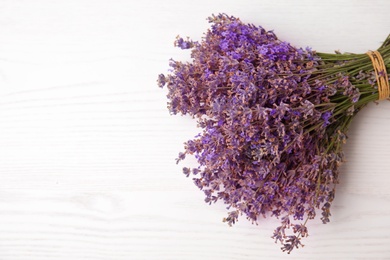 Lavender flowers on light background, top view