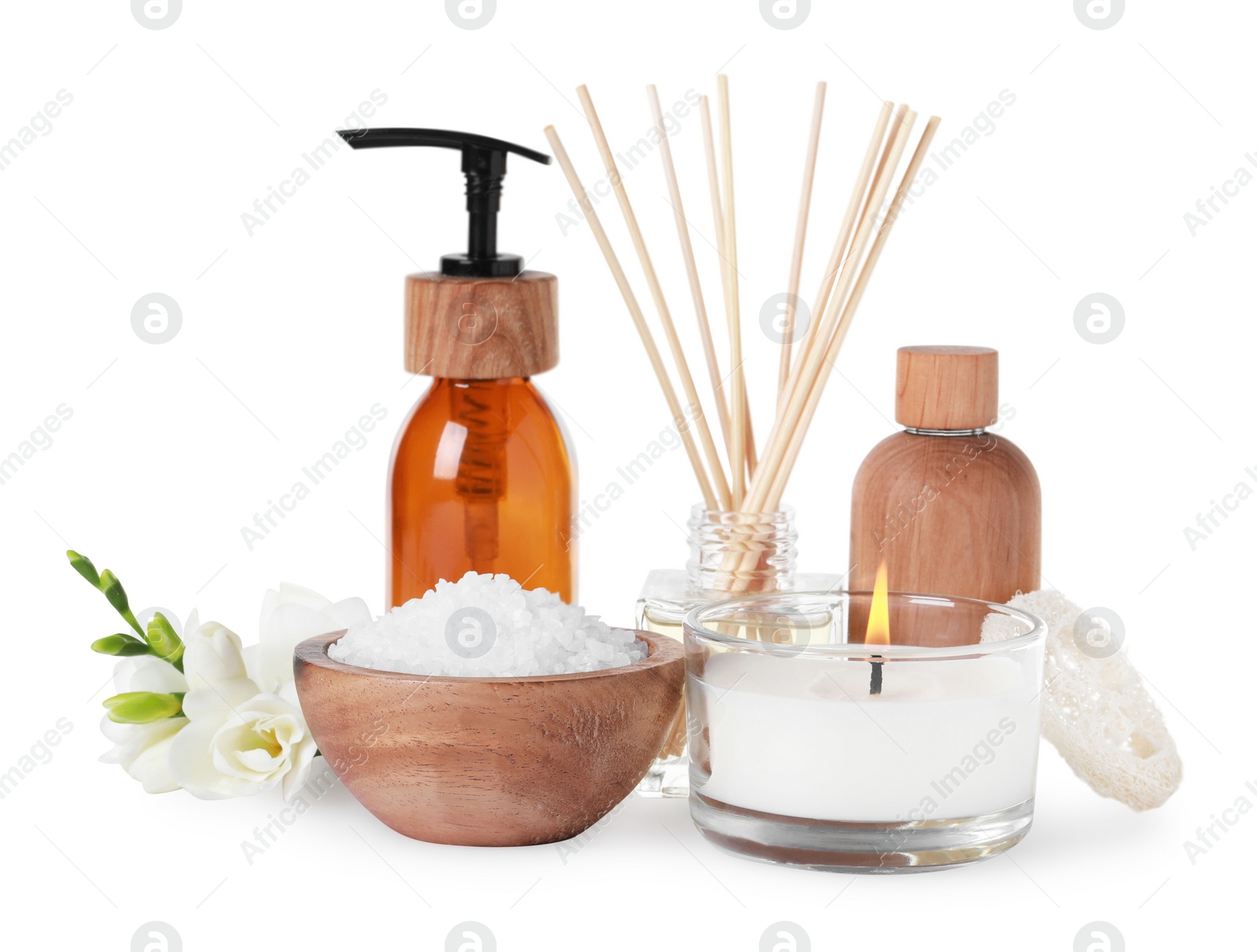 Photo of Beautiful spa composition with burning candle and different care products on white background