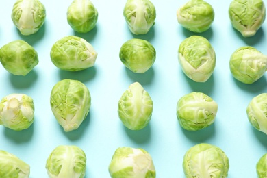 Photo of Fresh Brussels sprouts on color background. Organic vegetables