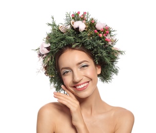 Photo of Happy young woman wearing wreath on white background