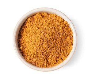 Photo of Curry powder in bowl isolated on white, top view