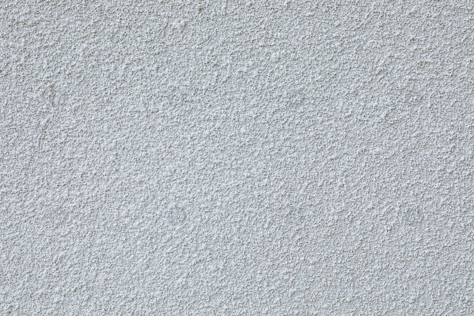 Photo of Texture of light plaster wall as background