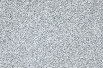 Photo of Texture of light plaster wall as background