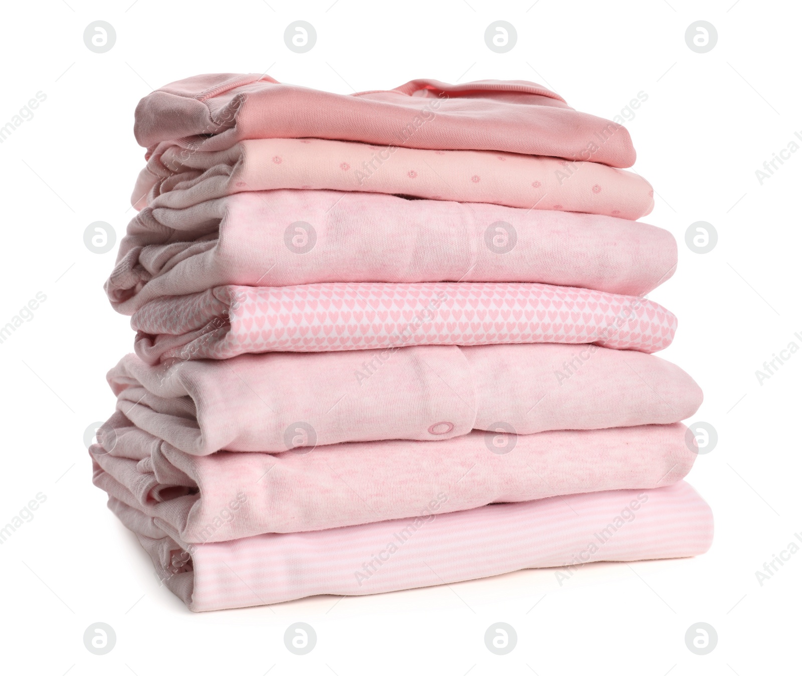 Photo of Stack of baby girl's clothes on white background