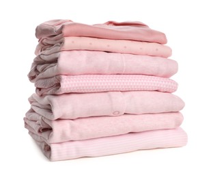 Photo of Stack of baby girl's clothes on white background