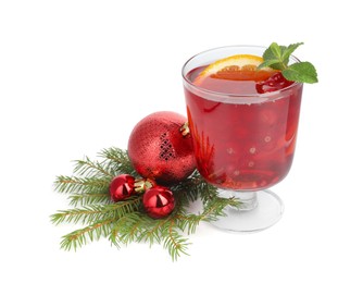 Photo of Aromatic Christmas Sangria in glass and festive decor isolated on white