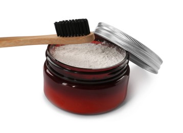 Photo of Jar of tooth powder and brush on white background