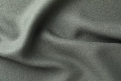 Photo of Texture of grey crumpled fabric as background, top view