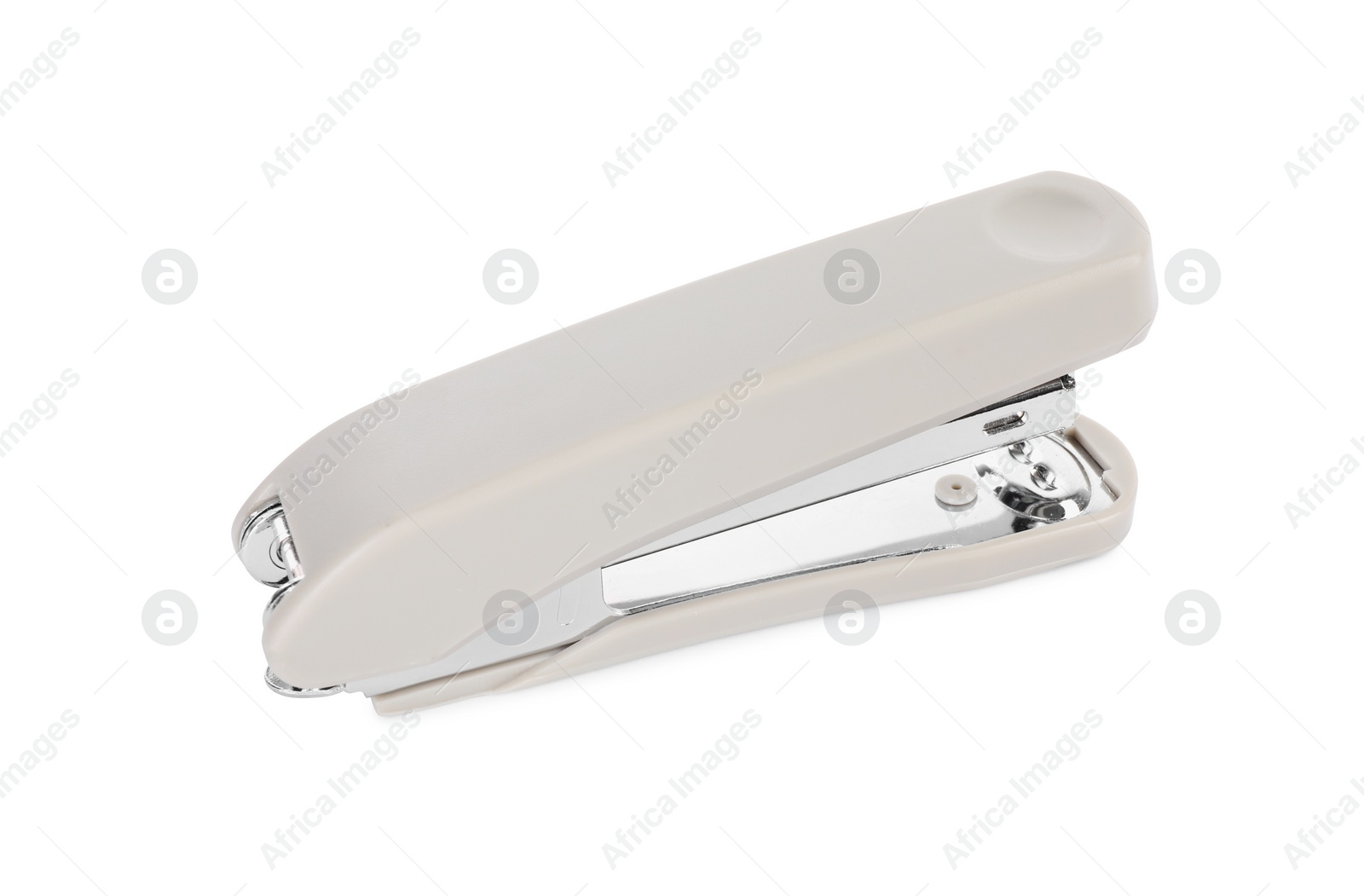 Photo of One new beige stapler isolated on white