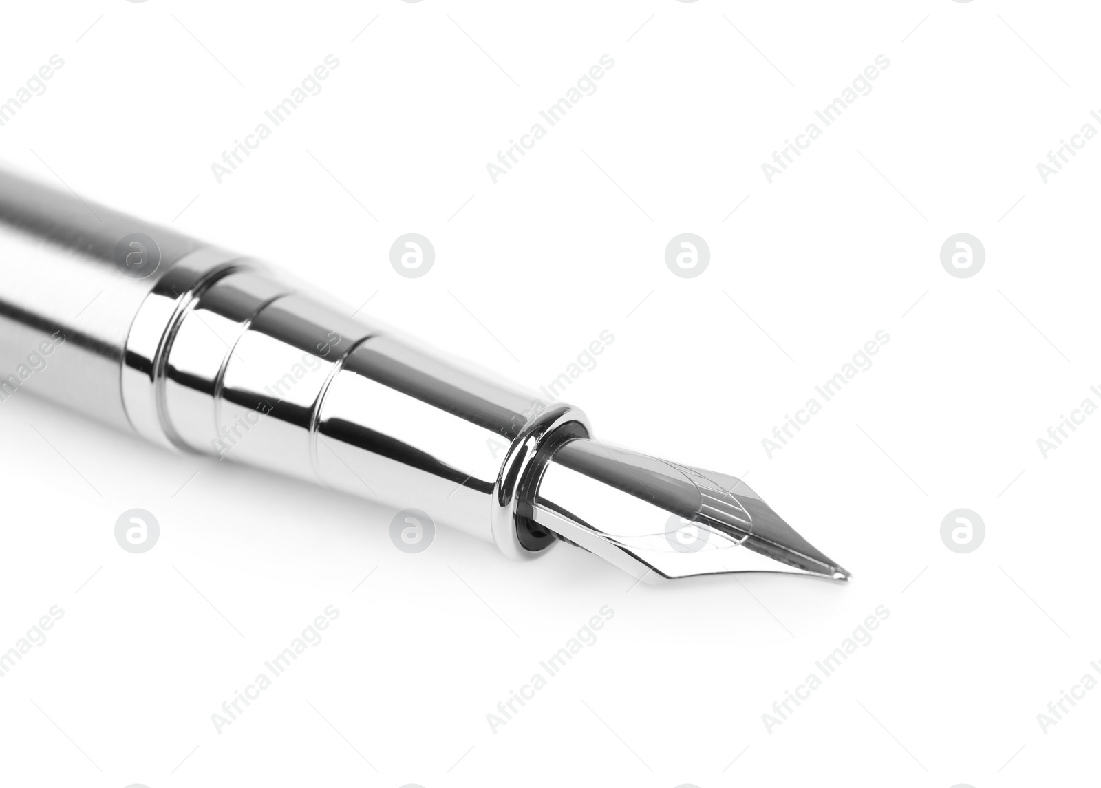 Photo of Stylish silver fountain pen isolated on white