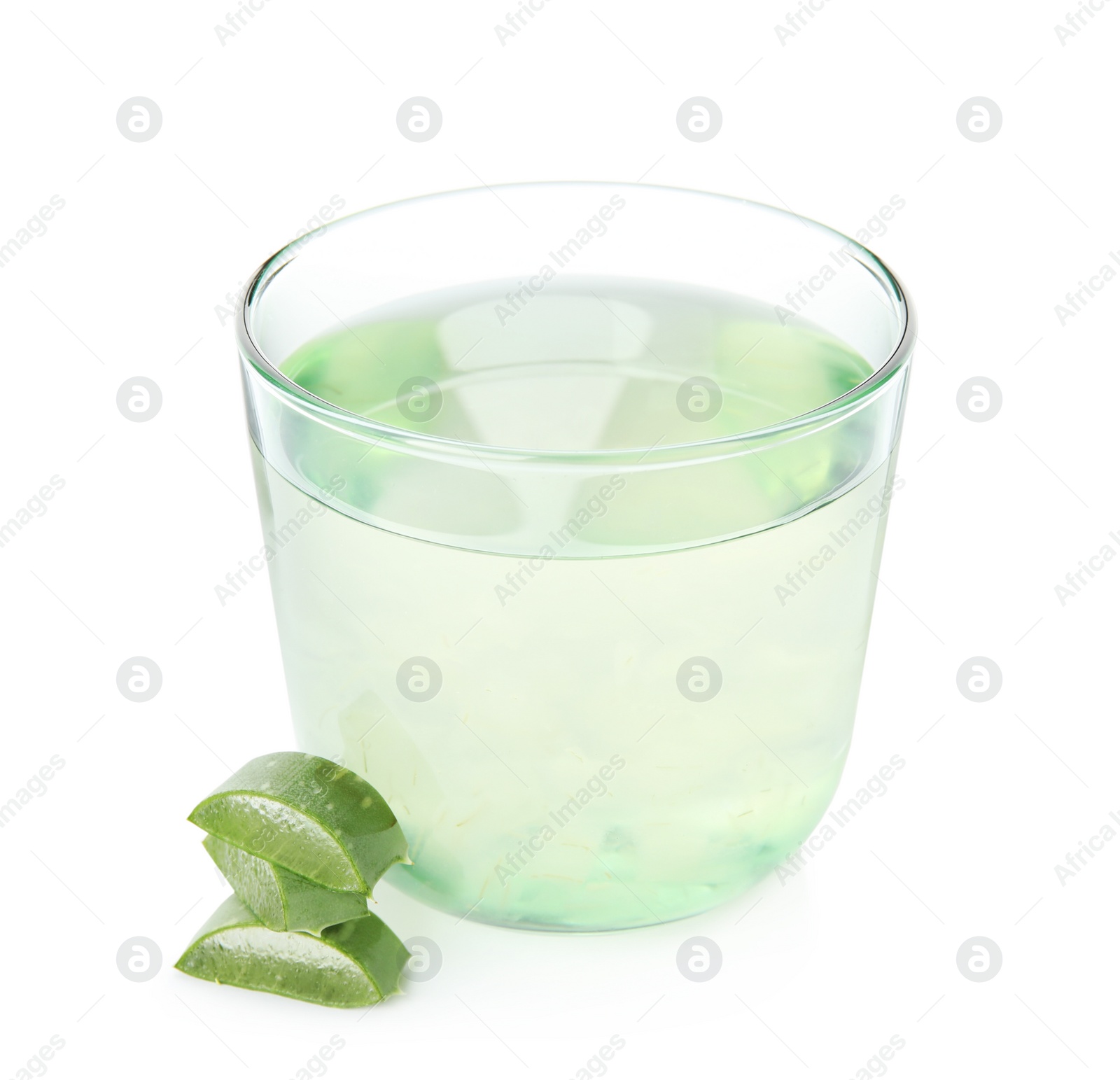 Photo of Fresh aloe drink in glass and leaf slices on white background