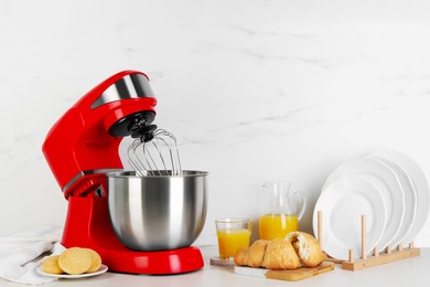 Photo of Composition with modern red stand mixer and different products on white table
