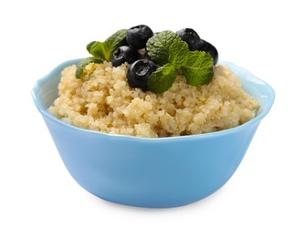 Photo of Tasty quinoa porridge with blueberries and mint in bowl isolated on white