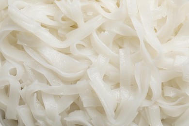 Closeup view of cooked rice noodles as background