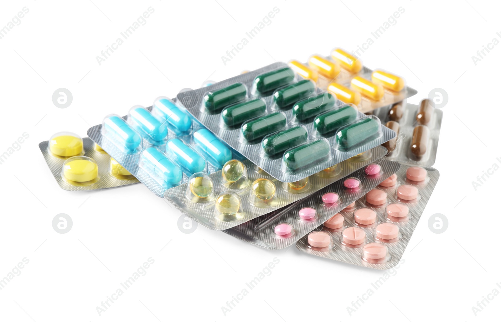 Photo of Blisters with different pills on white background