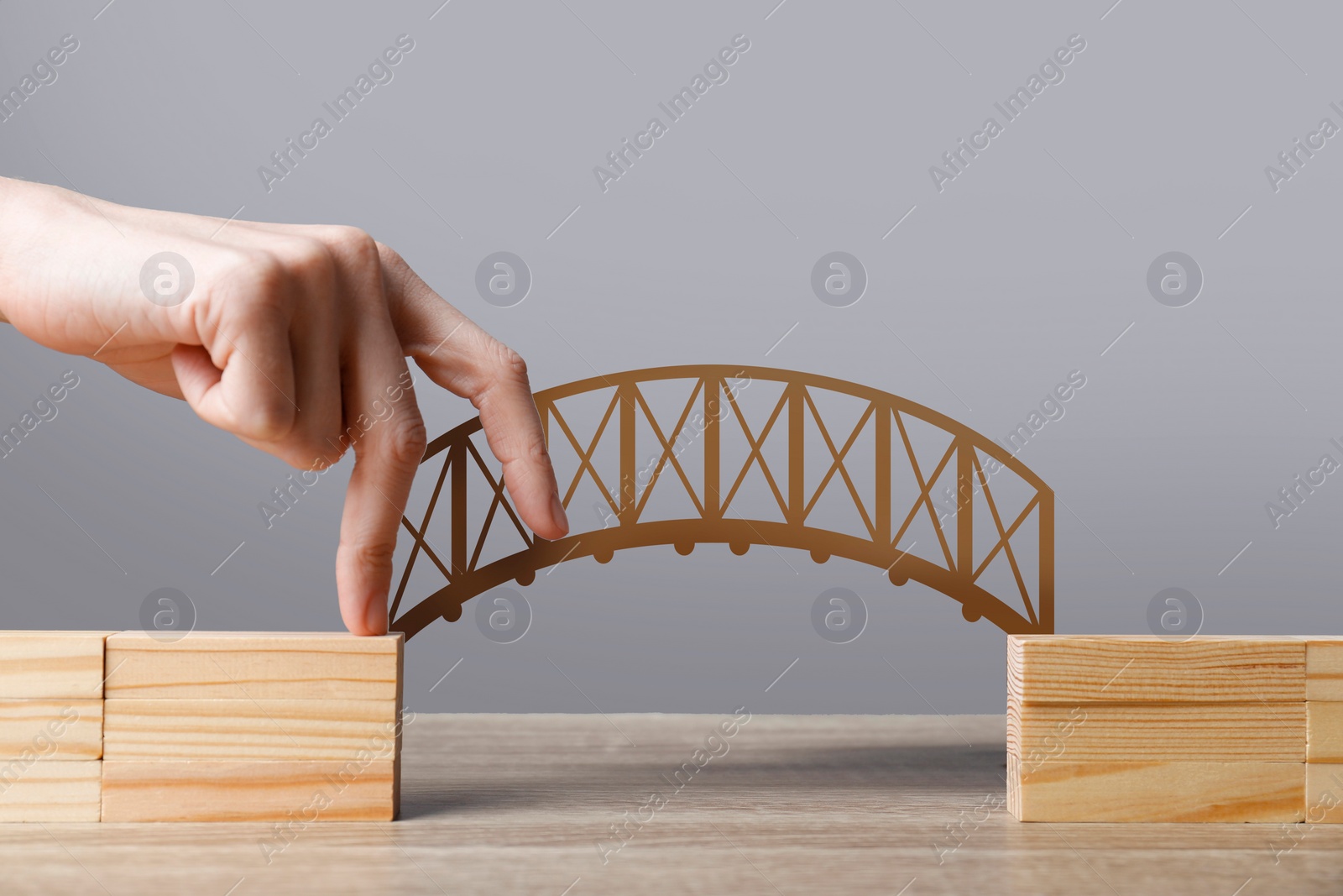 Image of Woman walking over drawn bridge with her fingers, closeup