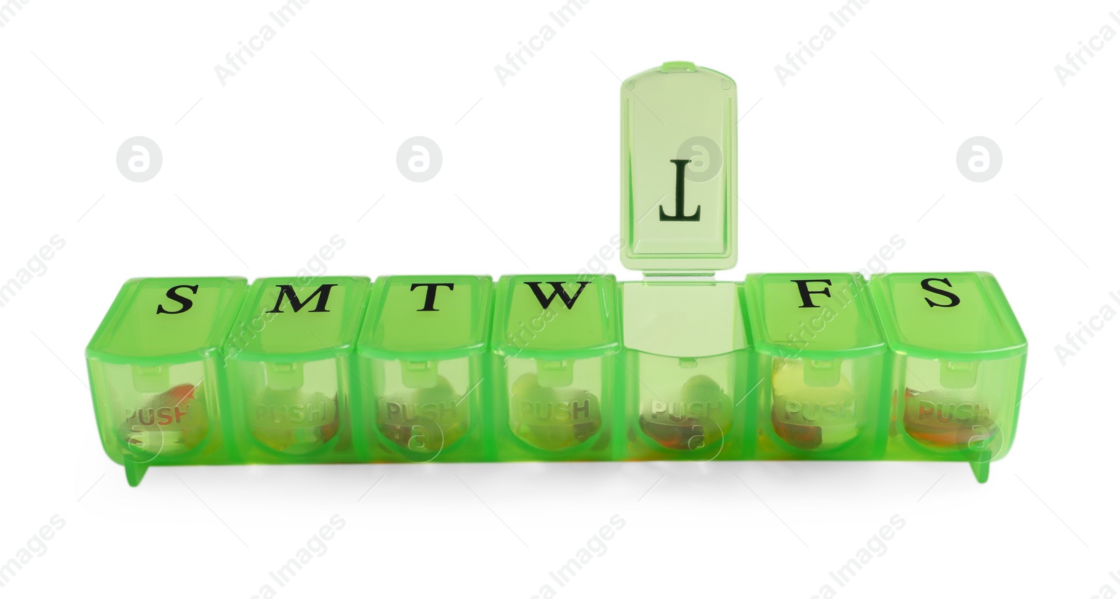 Photo of Different pills in organizer isolated on white