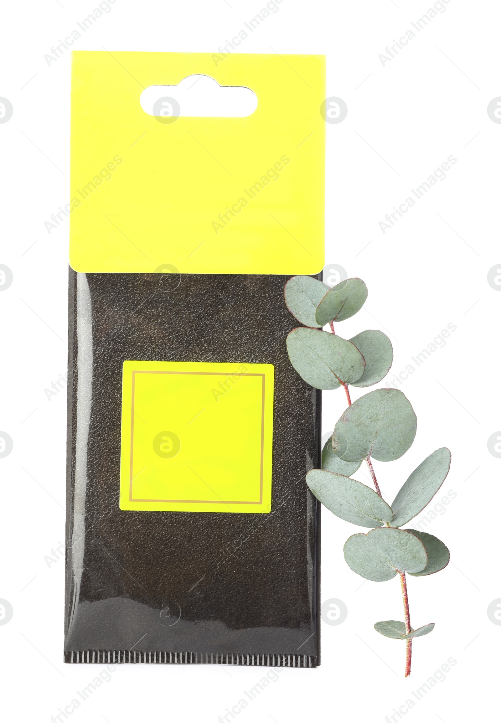 Photo of Scented sachet and eucalyptus branch on white background