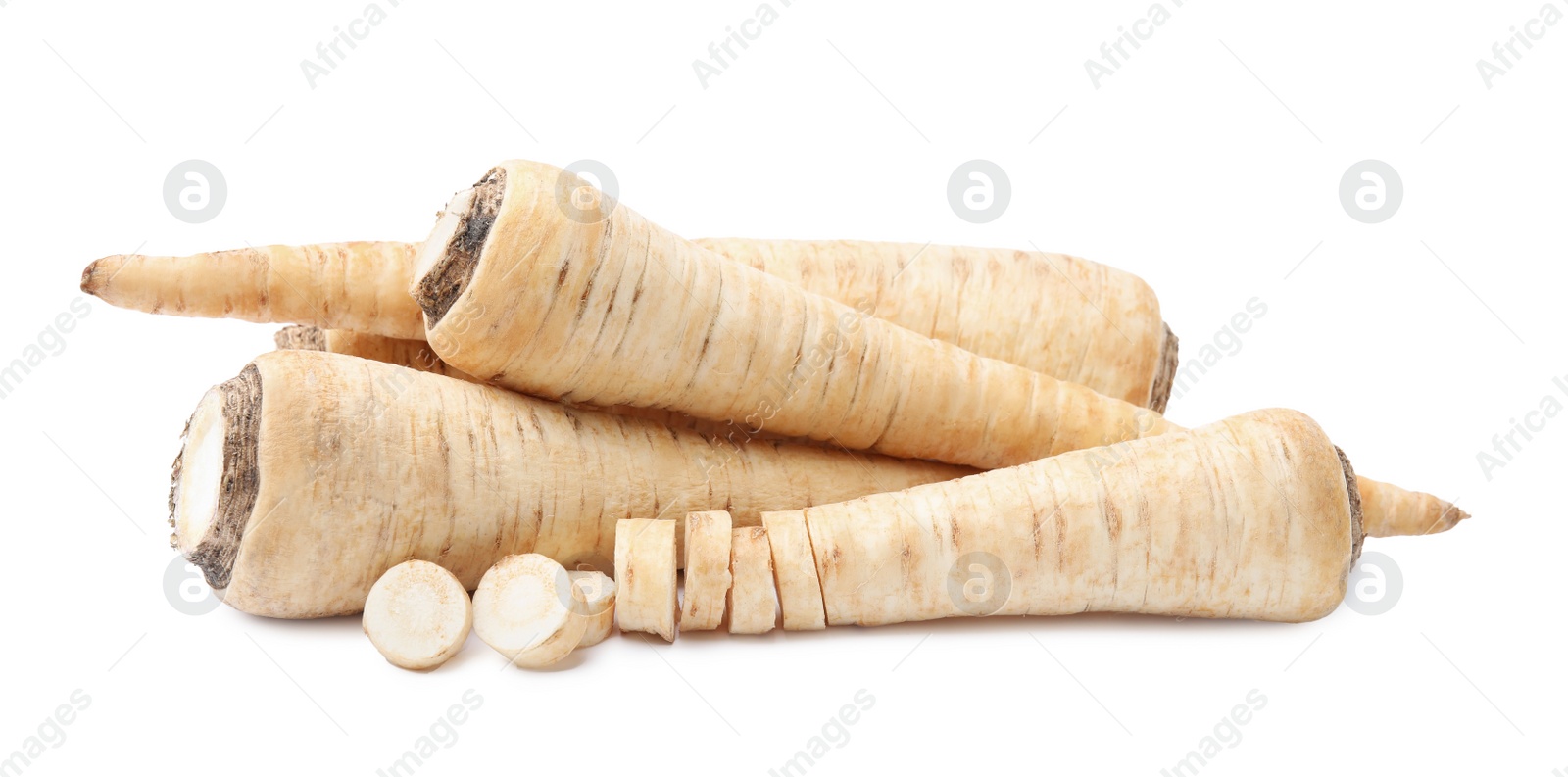 Photo of Raw parsley roots isolated on white. Healthy food