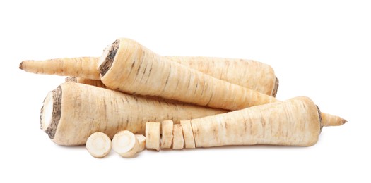 Photo of Raw parsley roots isolated on white. Healthy food