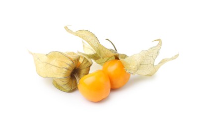 Many ripe physalis fruits with calyxes isolated on white