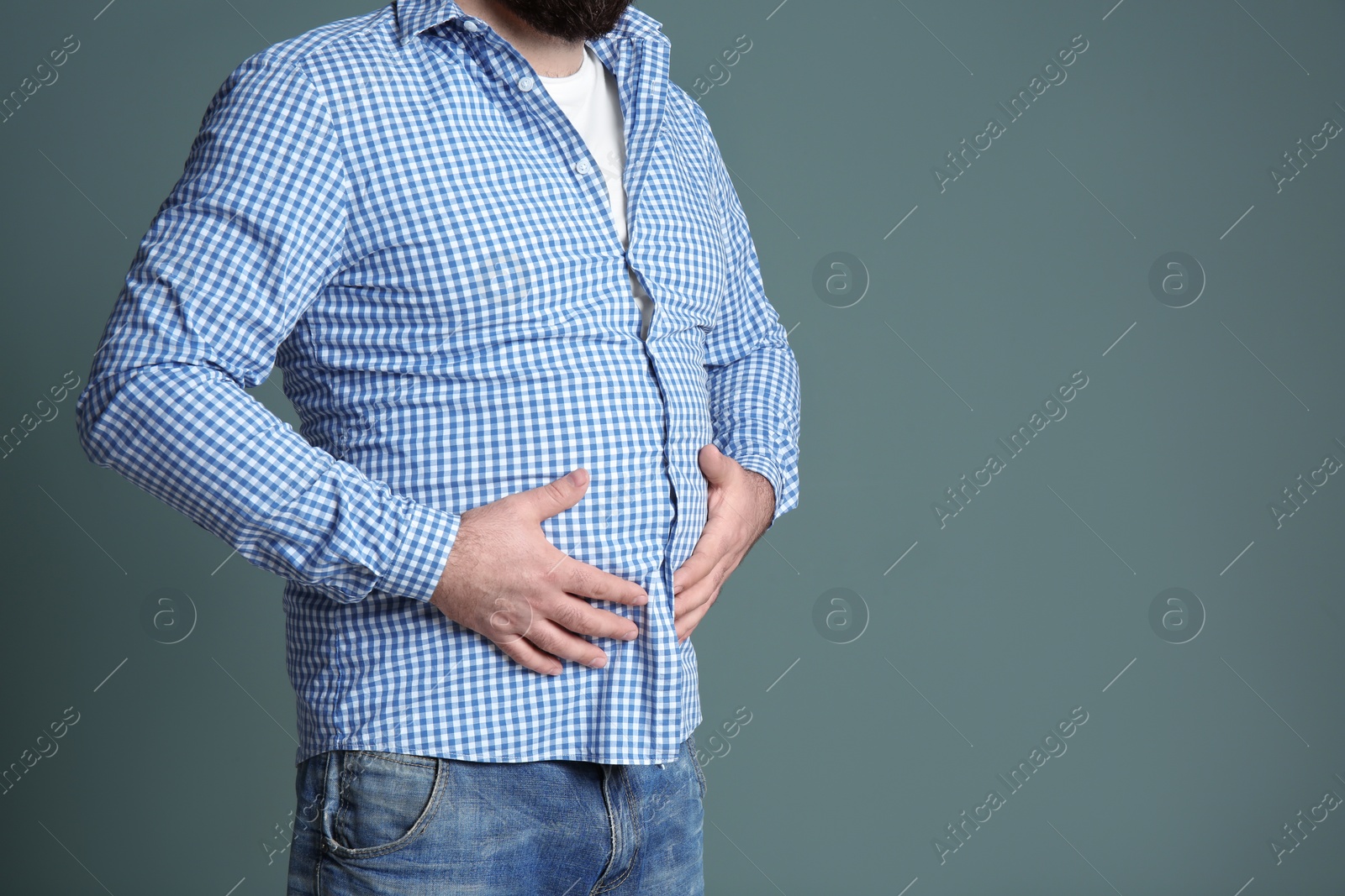 Photo of Overweight man on color background