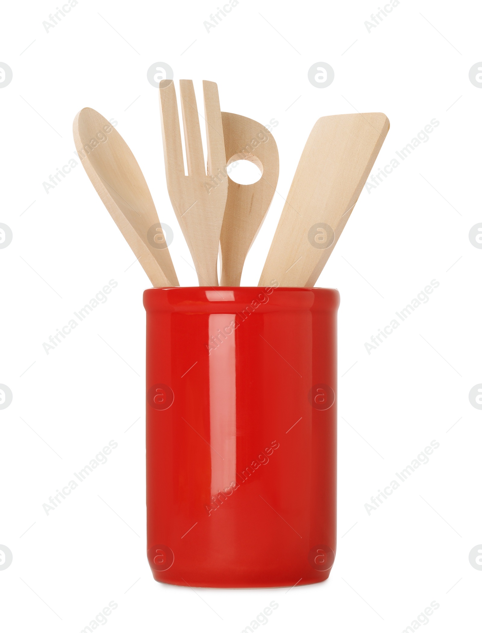 Photo of Set of kitchen utensils in red holder isolated on white