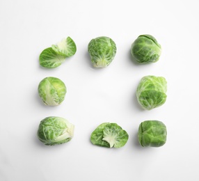 Fresh Brussels sprouts on white background, top view. Space for text