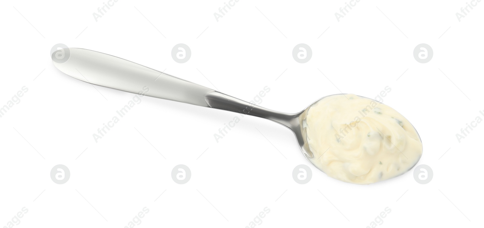 Photo of Tartar sauce in spoon isolated on white, top view
