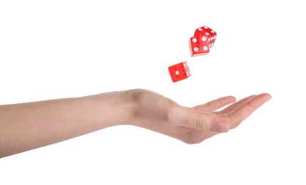 Woman throwing game dices on white background, closeup