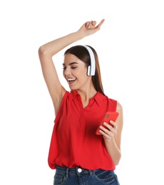 Photo of Beautiful young woman listening to music with headphones on white background