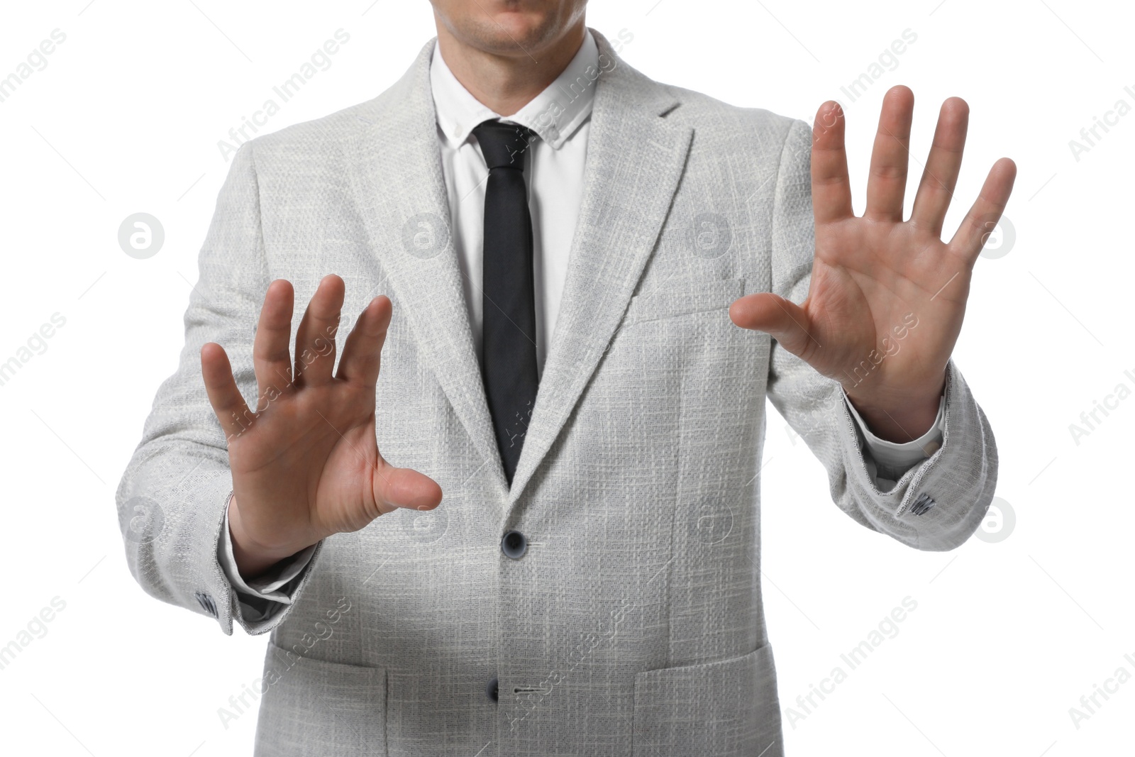 Photo of Businessman touching something on white background, closeup