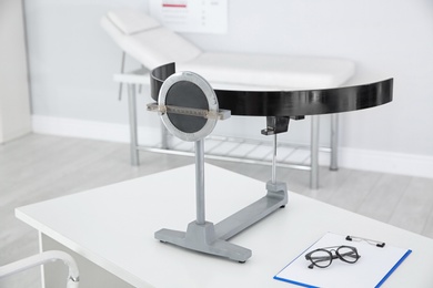 Campimeter on table in clinic. Ophthalmic equipment