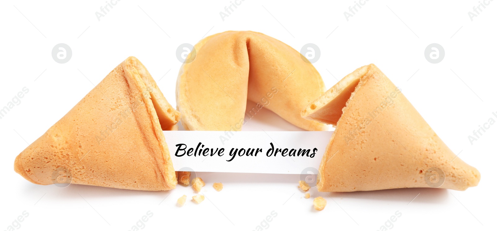 Image of Tasty fortune cookies with prediction Believe your dreams on white background
