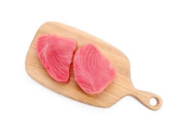 Photo of Fresh raw tuna fillets on white background, top view