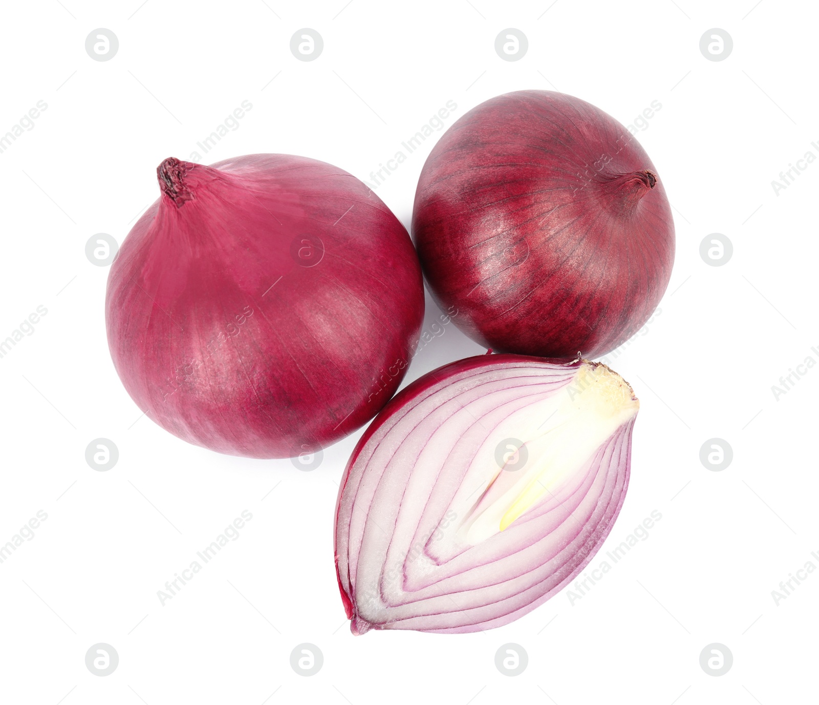 Photo of Fresh whole and cut red onions on white background, top view