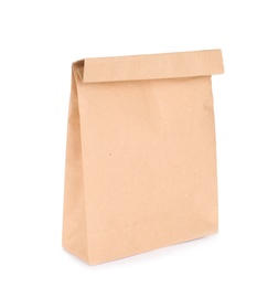 Photo of Paper bag isolated on white. Mockup for design