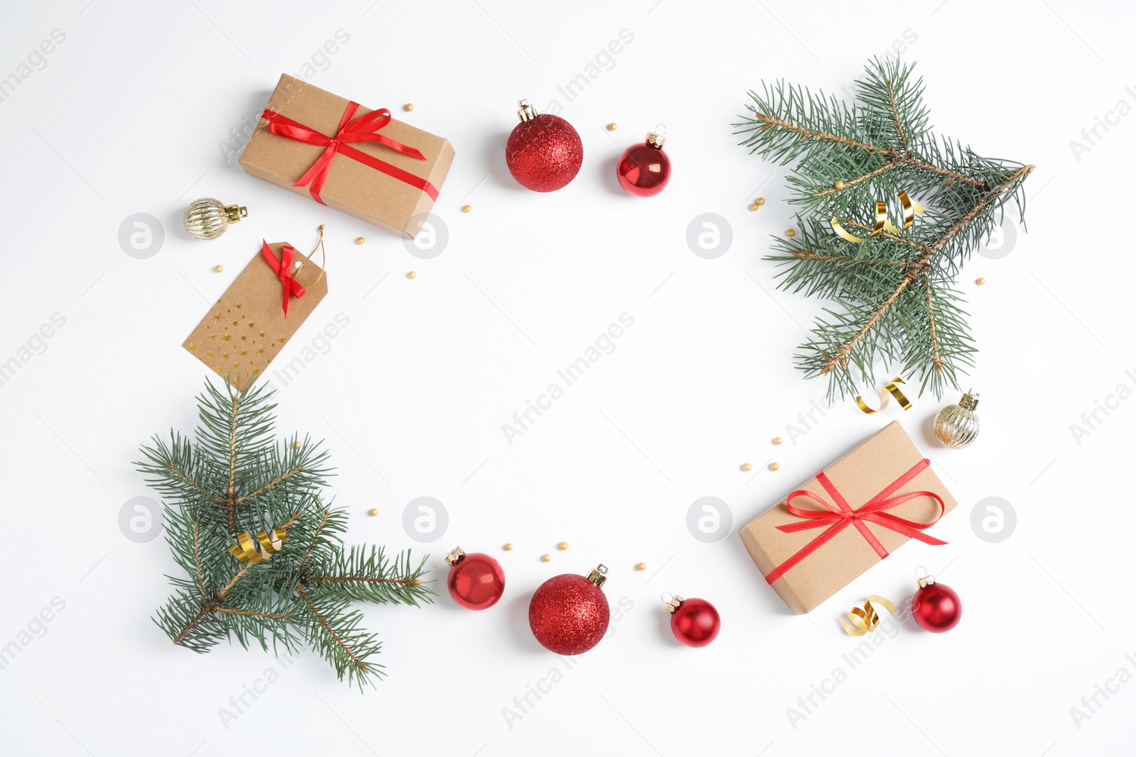 Photo of Fir tree branches with Christmas decoration on white background, top view. Space for text