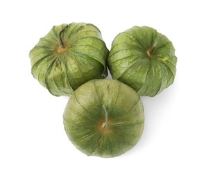 Fresh green tomatillos with husk isolated on white, top view