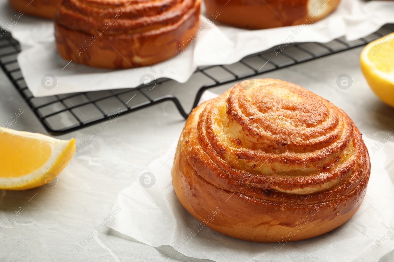 Photo of Tasty bun on table, space for text. Fresh from oven