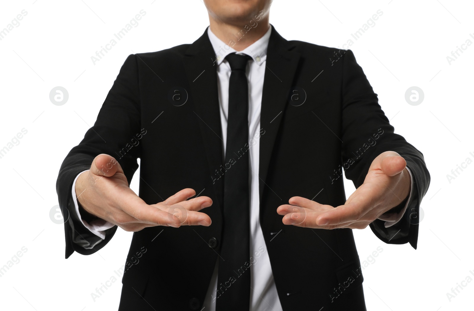 Photo of Businessman holding something on white background, closeup