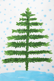 Photo of Child's painting of fir tree on white paper