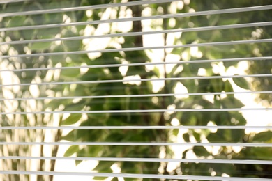 Open white horizontal window blinds, closeup view