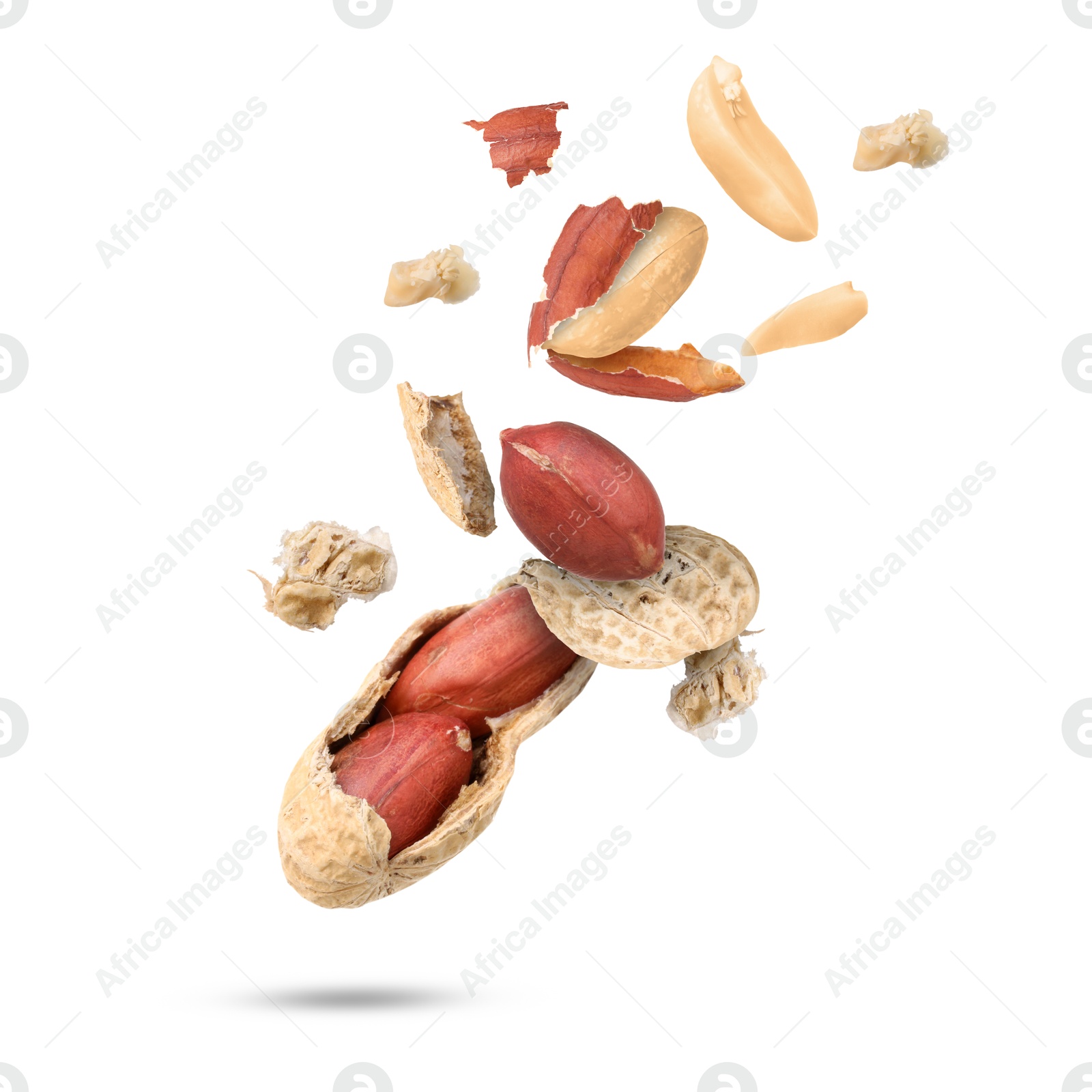 Image of Peanuts and crushed pod in air on white background