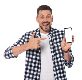 Photo of Emotional man pointing at smartphone on white background