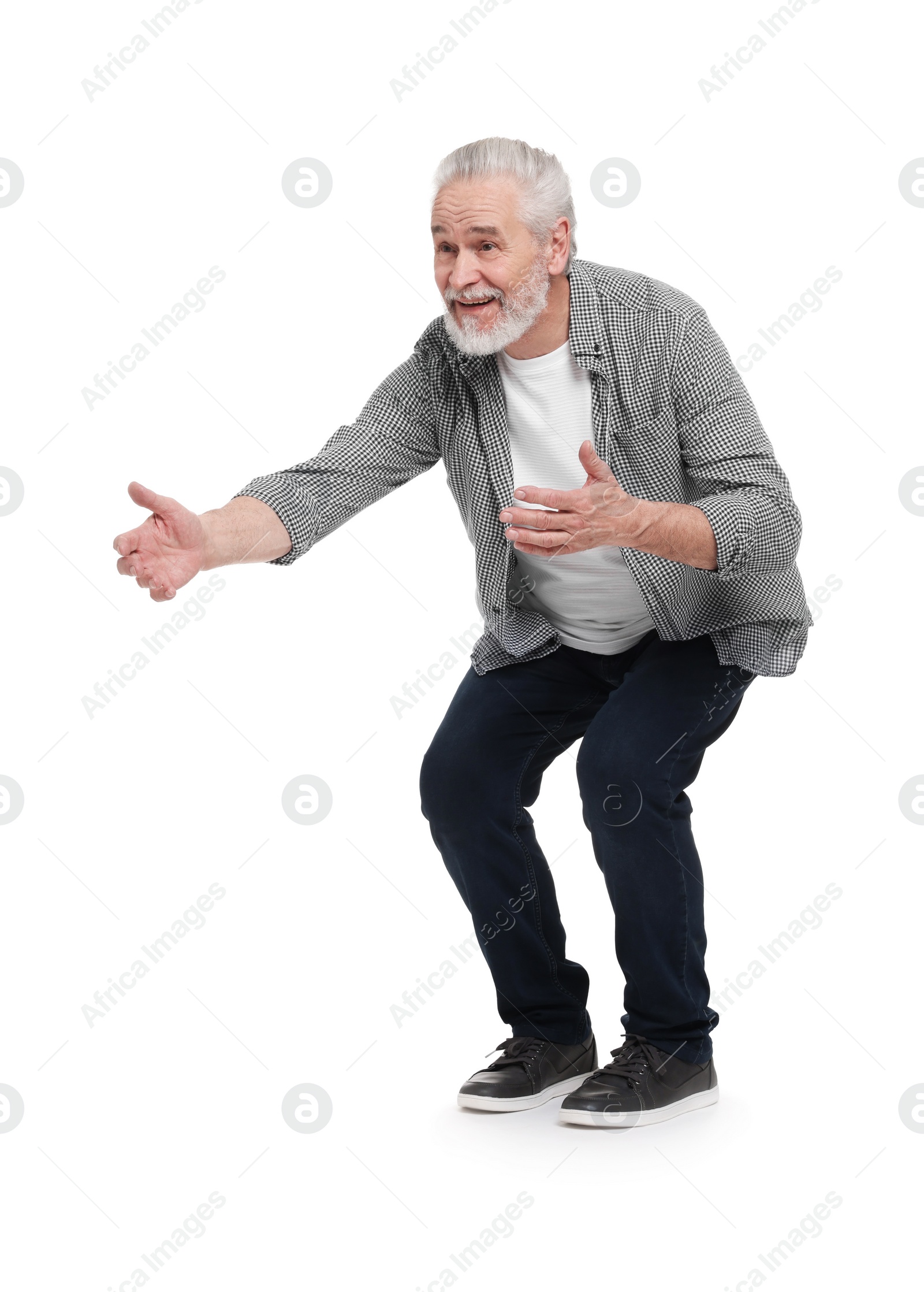 Photo of Senior man greeting someone on white background