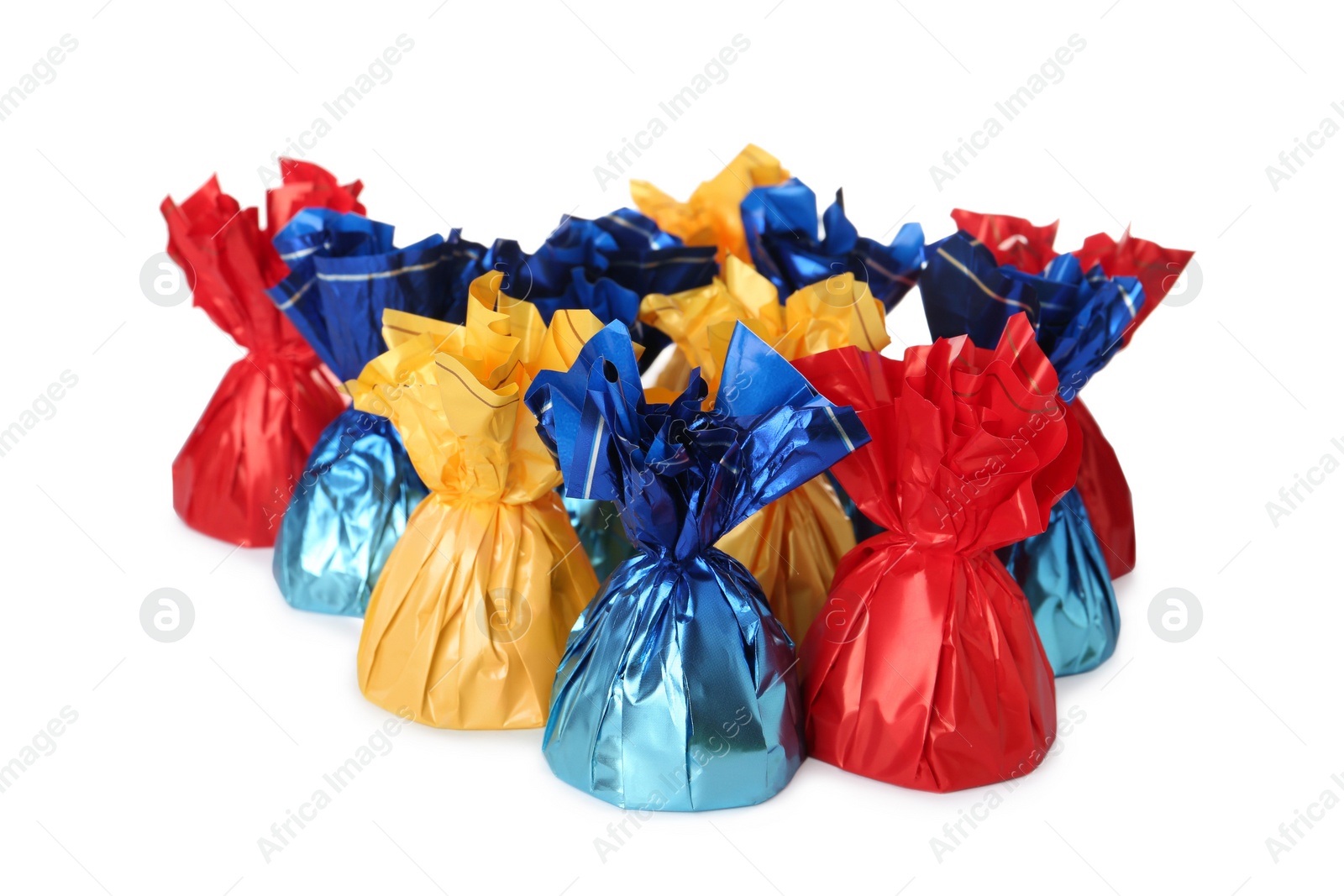 Photo of Delicious candies in colorful wrappers on white background