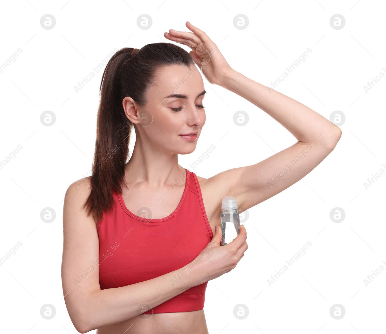 Photo of Beautiful woman applying deodorant on white background