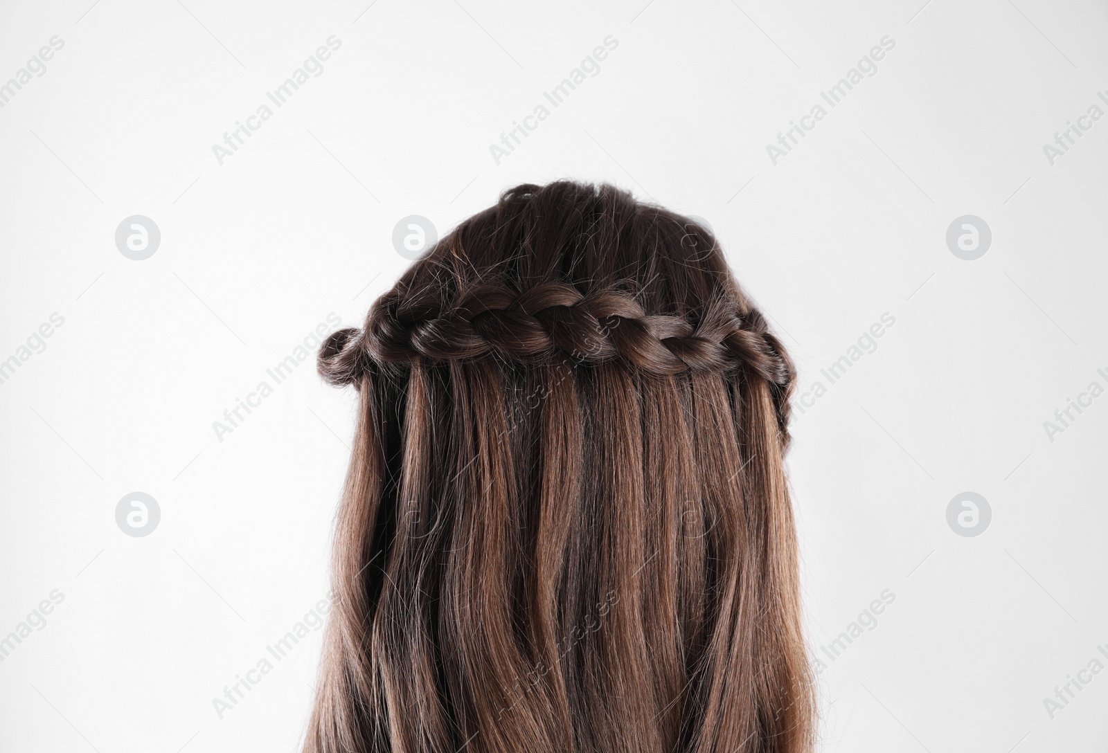 Photo of Woman with braided hair on light background, closeup